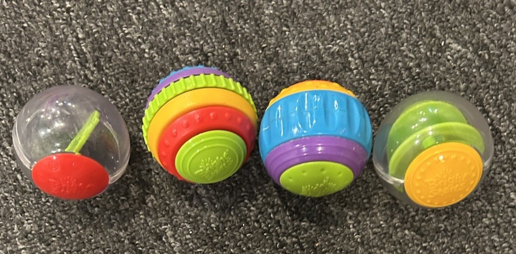 BRIGHT STARTS SHAKE & SPIN ACTIVITY BALLS~SET OF 4~SENSORY RATTLES BABY TOY