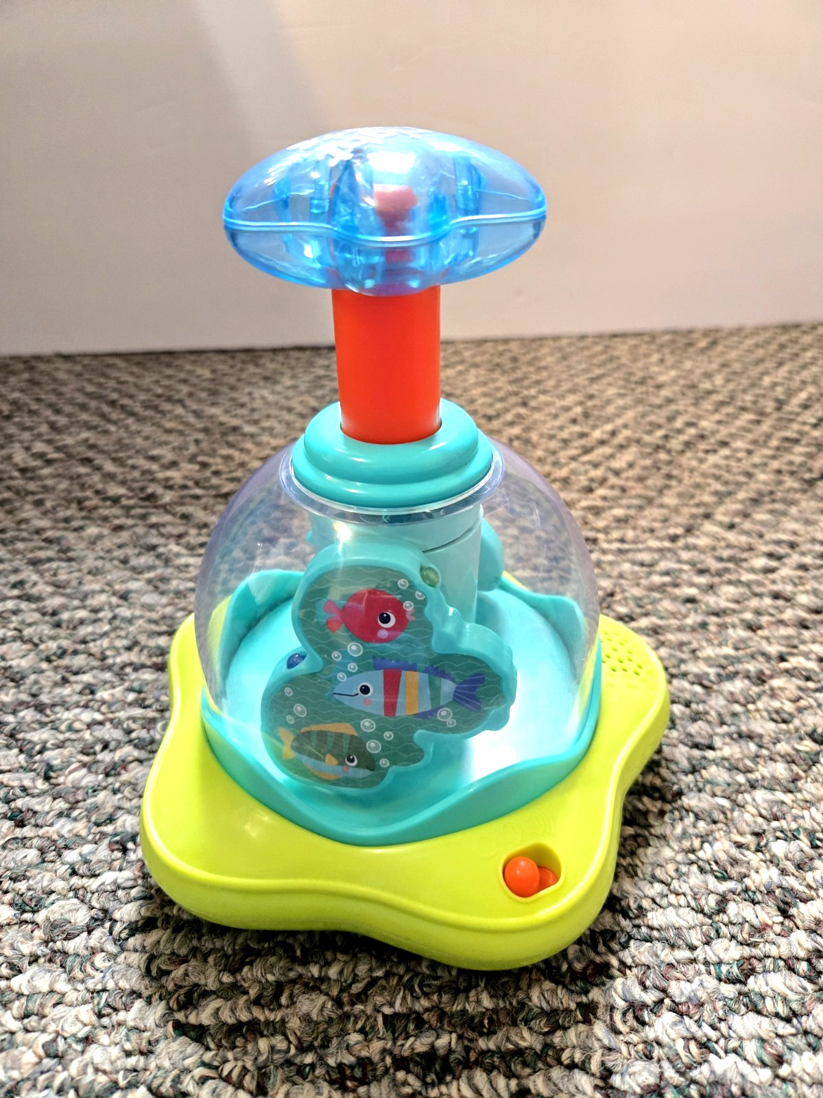 Bright Starts Press & Glow Spinning Top w/Lights & Music Toy Ages 6-36 mos.