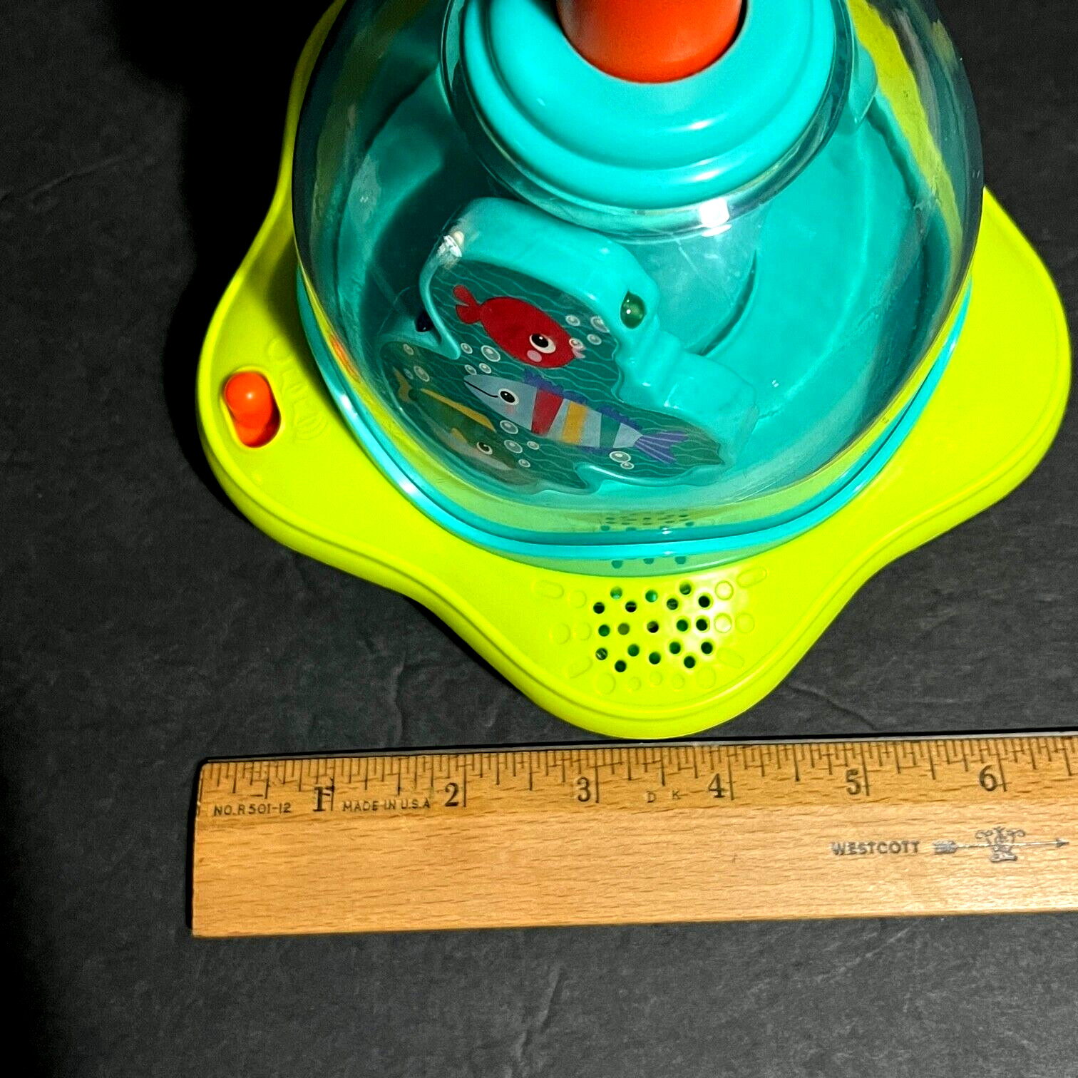 Bright Starts Press & Glow Spinning Top w/Lights & Music Ages 6-36 mos.