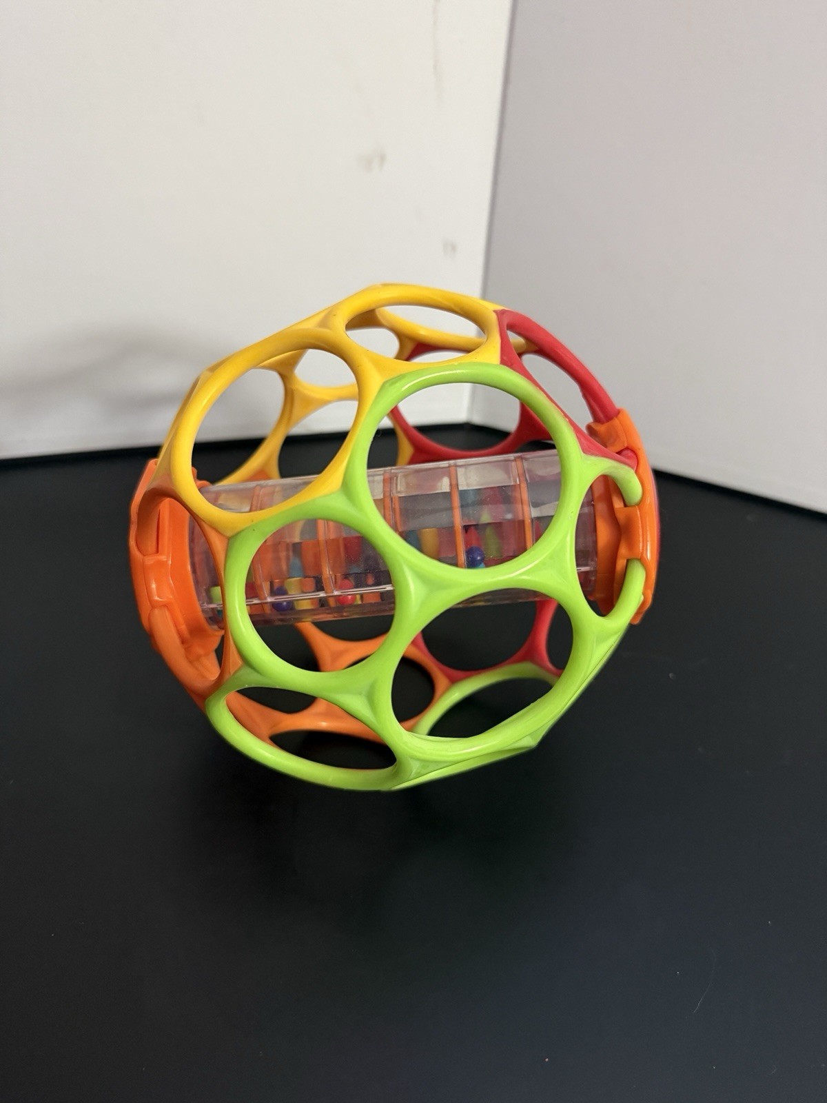 Oball Rollin’ Rainstick Multicolor Baby Rattle Ball for Hand-Eye Coordination
