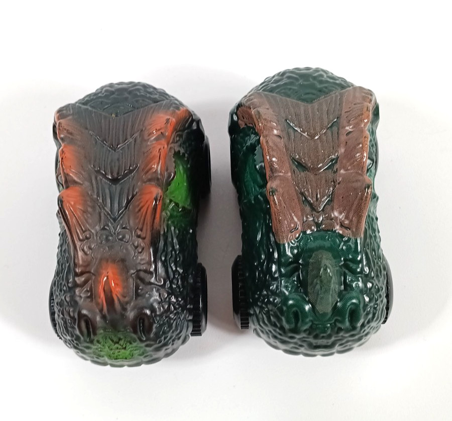 Dinosaur Head Monster Truck Toy Battery Powered Eyes Light Up 2 pack