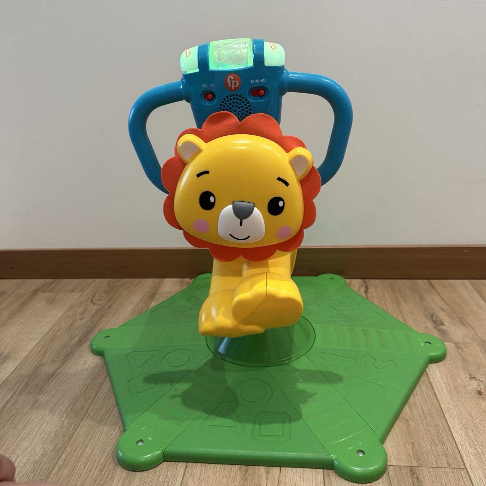 Fisher Price Toddler Learning Toy Bounce & Spin Lion Ride-On