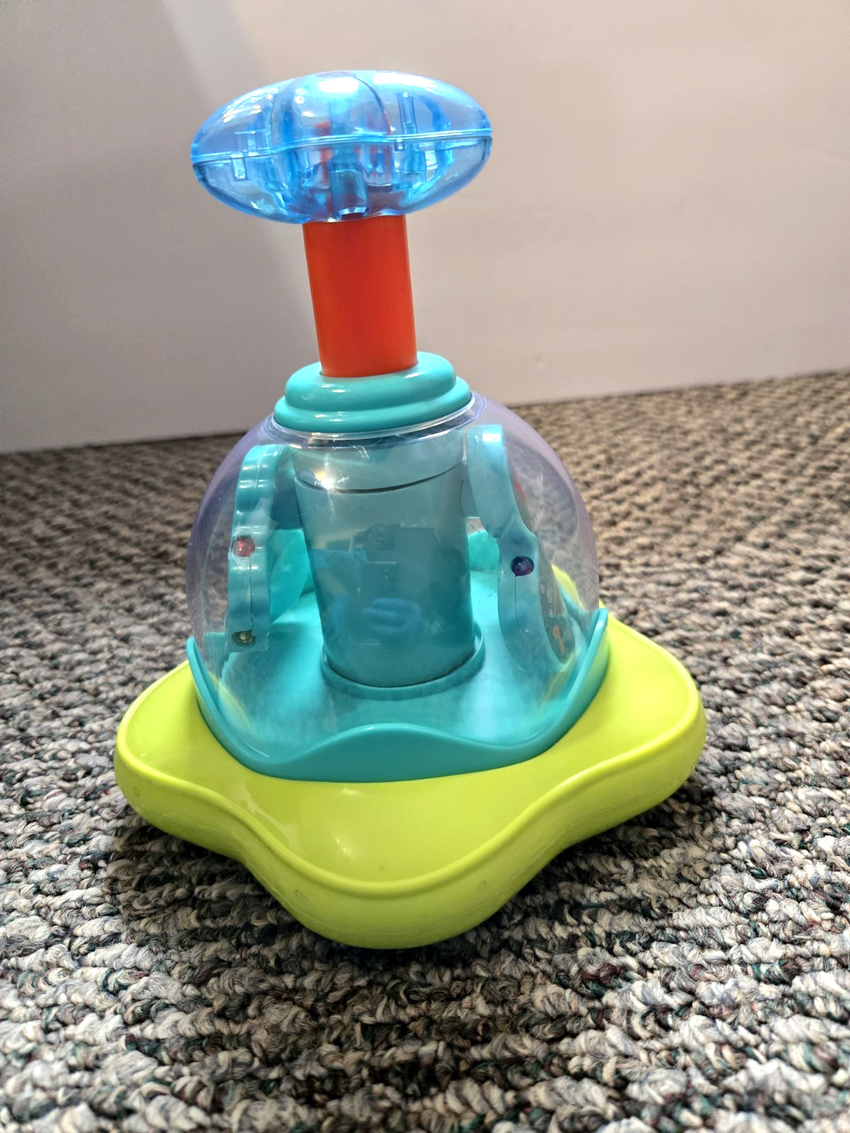 Bright Starts Press & Glow Spinning Top w/Lights & Music Toy Ages 6-36 mos.