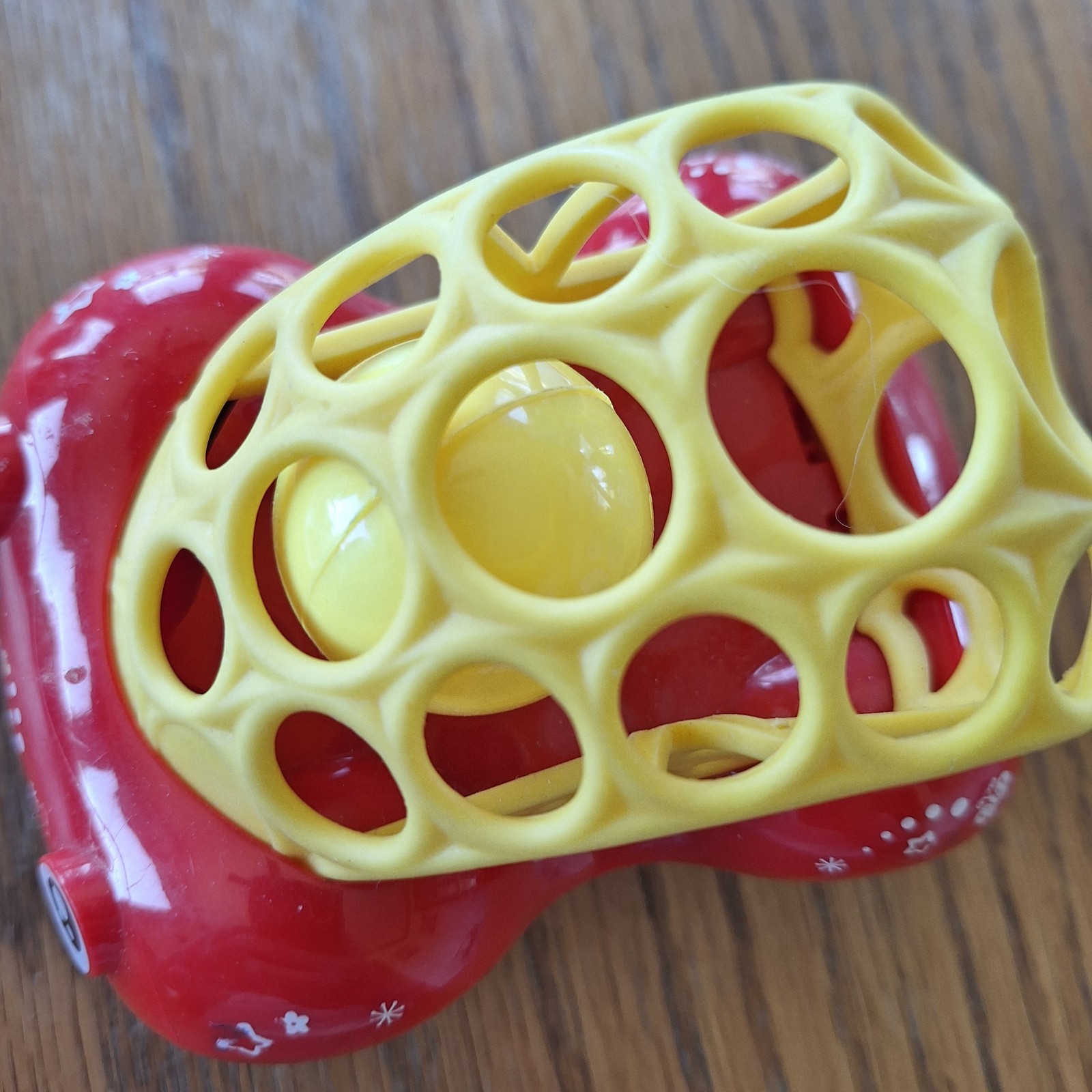 Oball Easy Grasp Rattle & Roll Car Red used