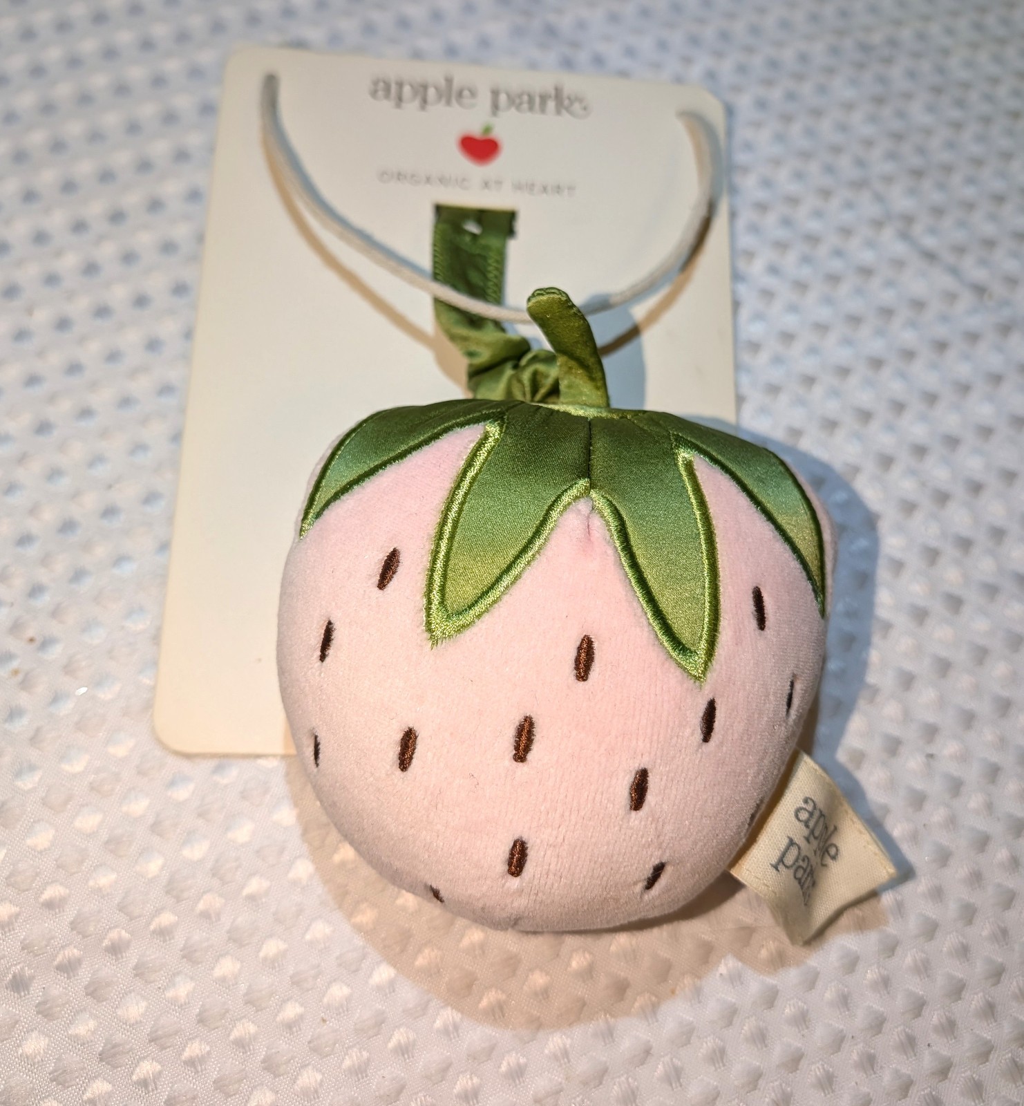 Apple Park Organic Pink Strawberry Baby Stroller Toy Vibrating Pull String – new