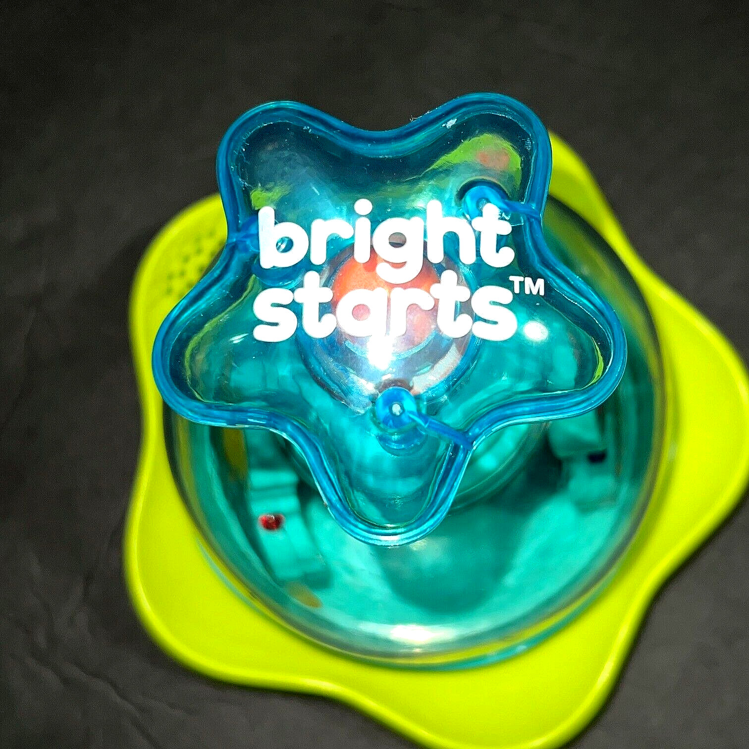 Bright Starts Press & Glow Spinning Top w/Lights & Music Ages 6-36 mos.