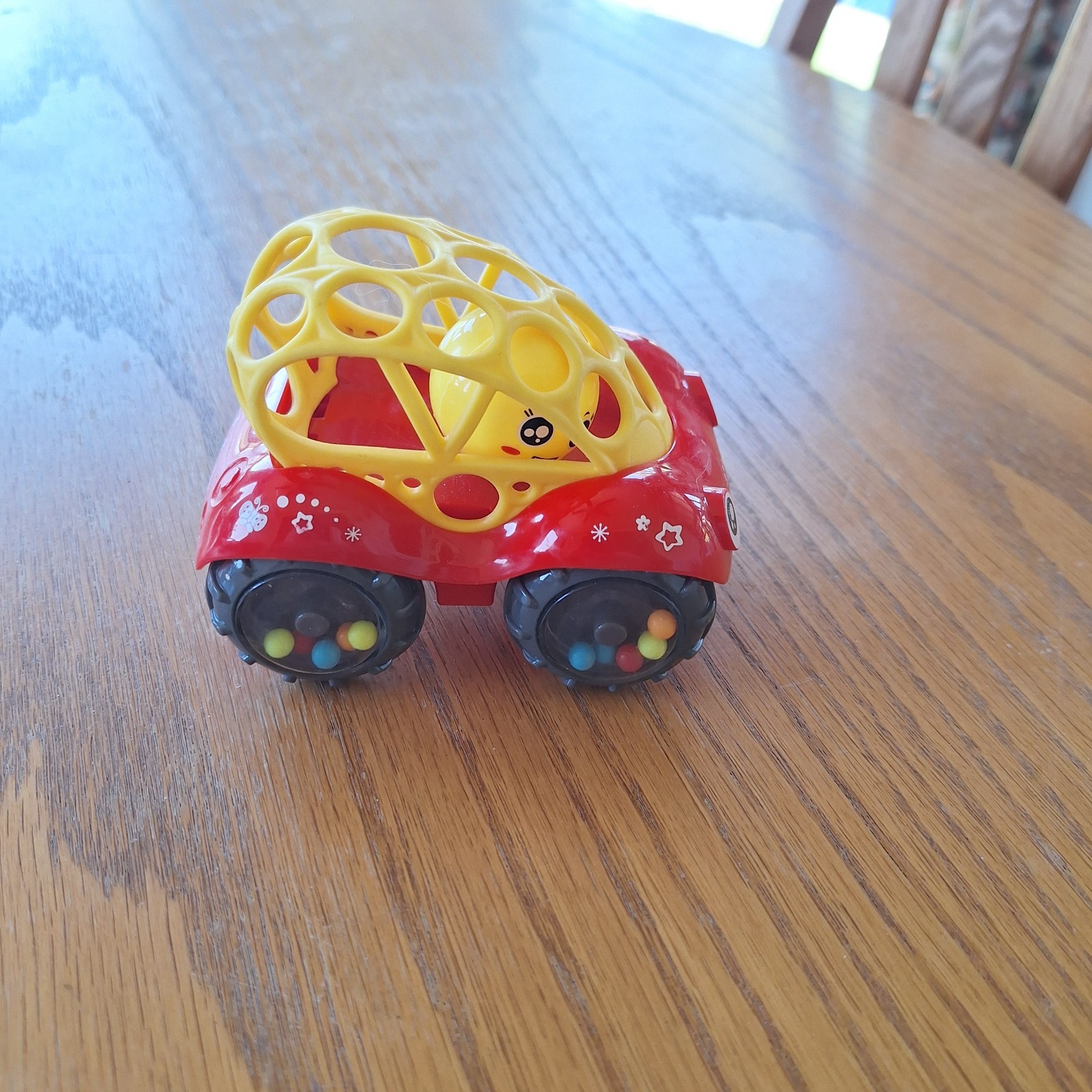 Oball Easy Grasp Rattle & Roll Car Red used
