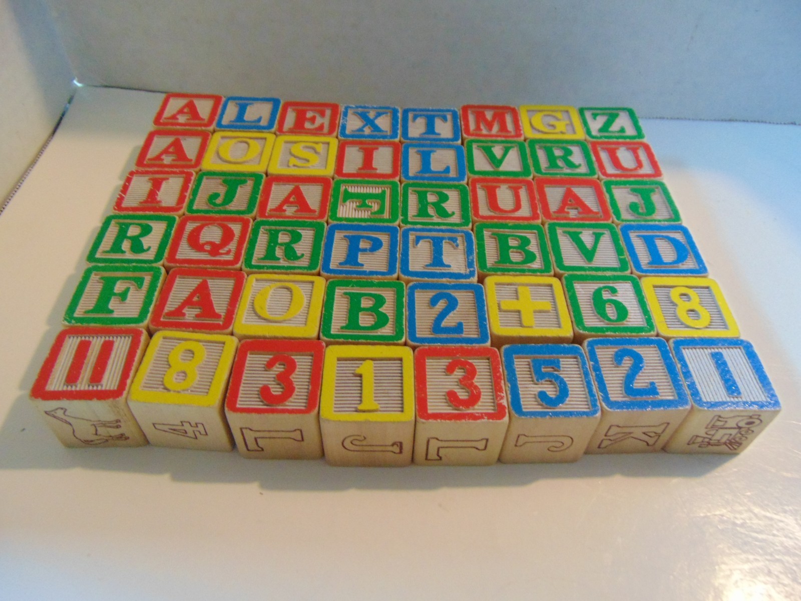 48- Colorful Wooden Childrens Letter Blocks.