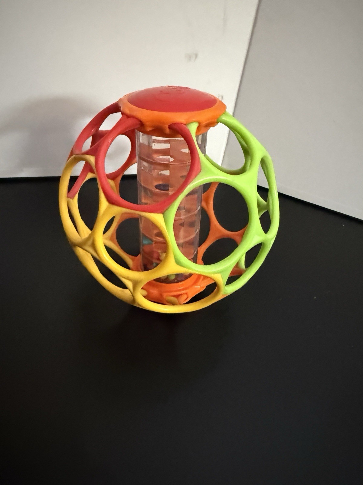 Oball Rollin’ Rainstick Multicolor Baby Rattle Ball for Hand-Eye Coordination