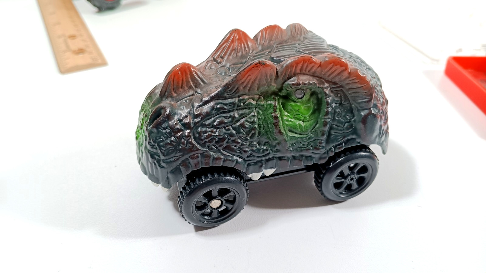 Dinosaur Head Monster Truck Toy Battery Powered Eyes Light Up 2 pack