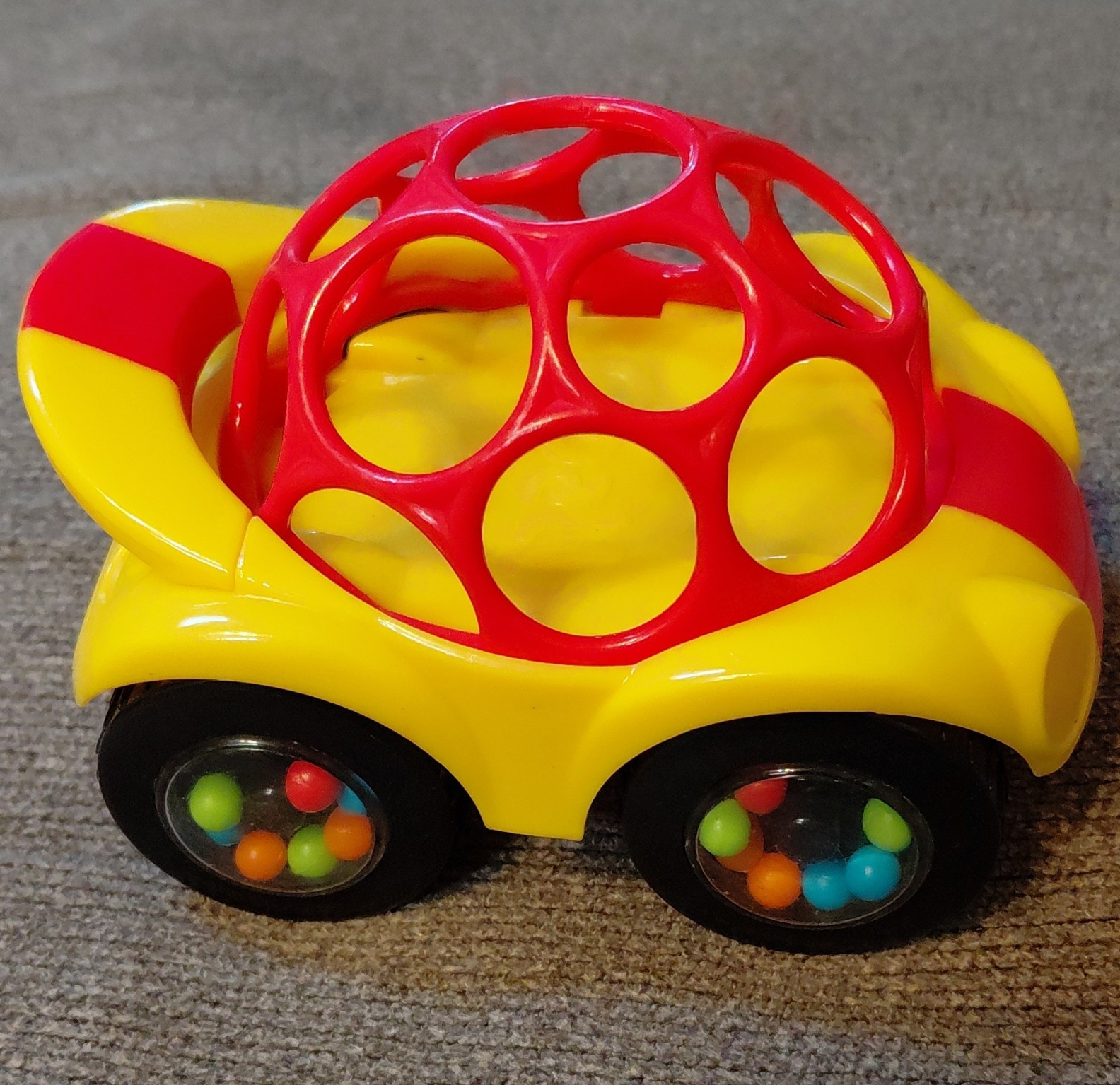 Oball Baby Car Rattle Rolling Vehicle Toy with Bead Wheels Yellow Red Black