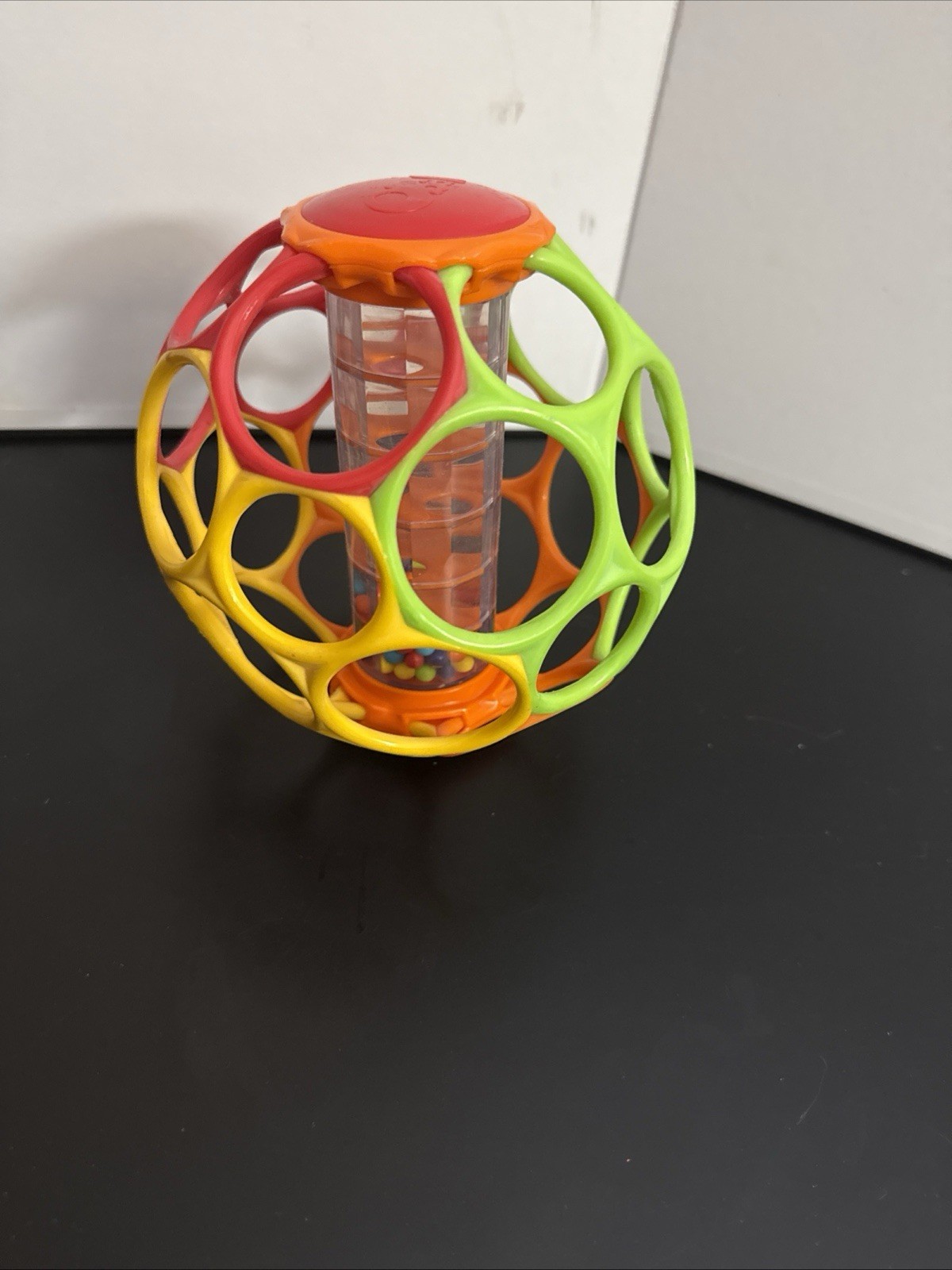 Oball Rollin’ Rainstick Multicolor Baby Rattle Ball for Hand-Eye Coordination