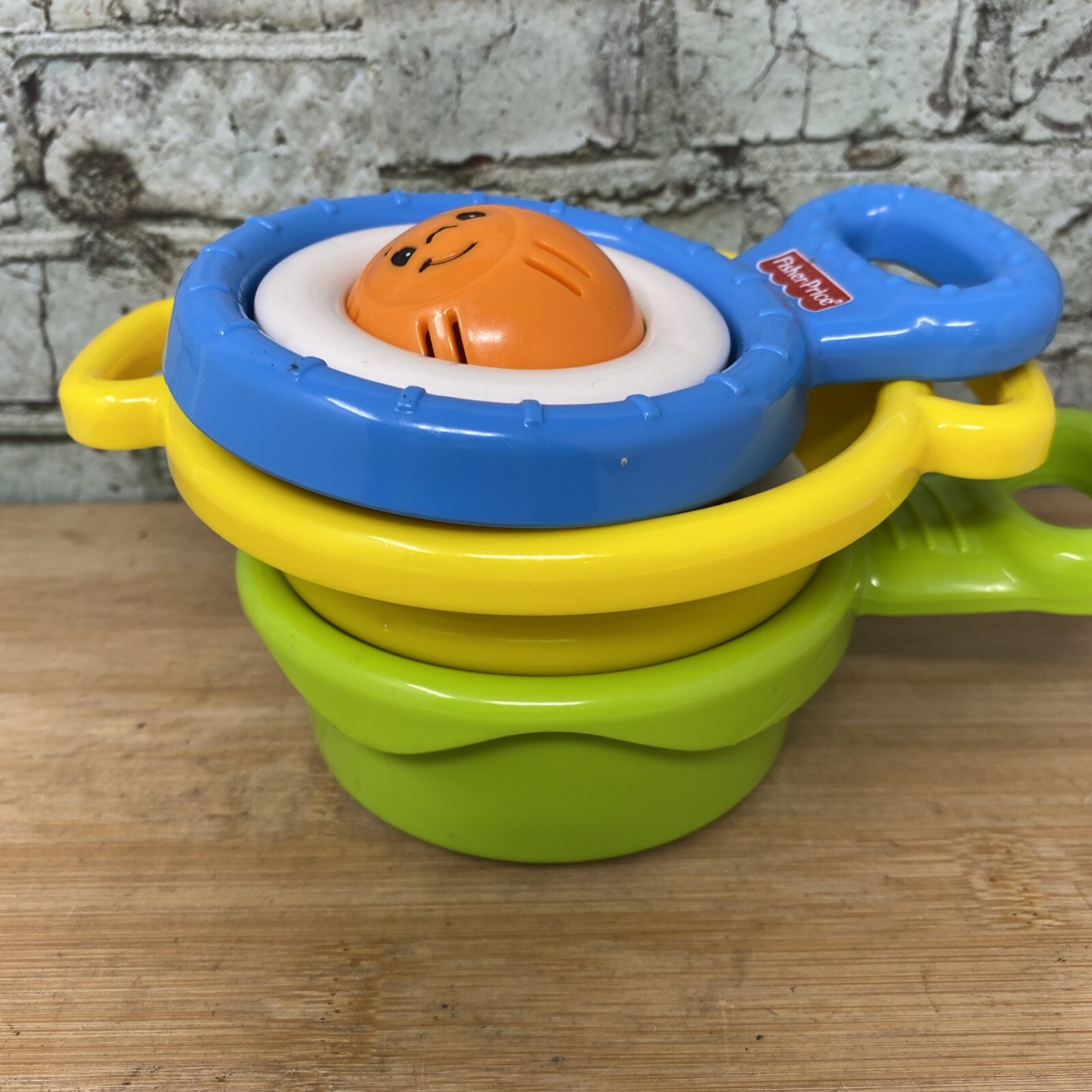 Fisher Price Brilliant Basics Stack and Nest Pots and Pans Yellow Green Blue