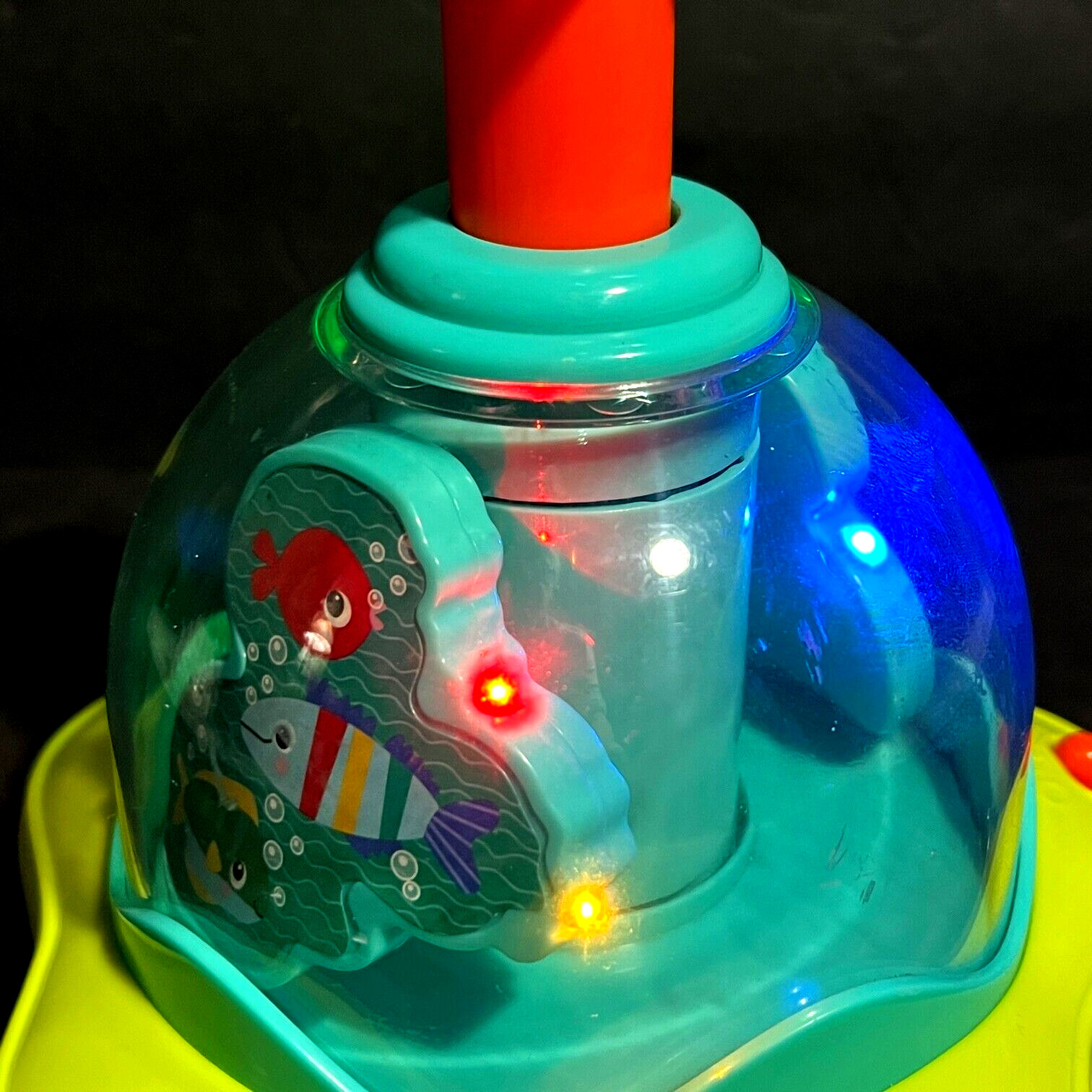 Bright Starts Press & Glow Spinning Top w/Lights & Music Ages 6-36 mos.