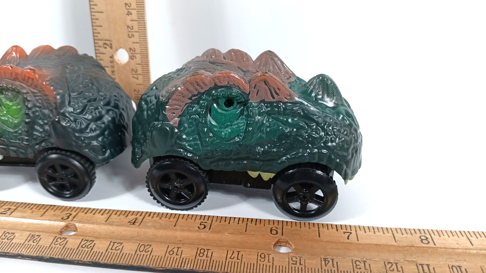 Dinosaur Head Monster Truck Toy Battery Powered Eyes Light Up 2 pack