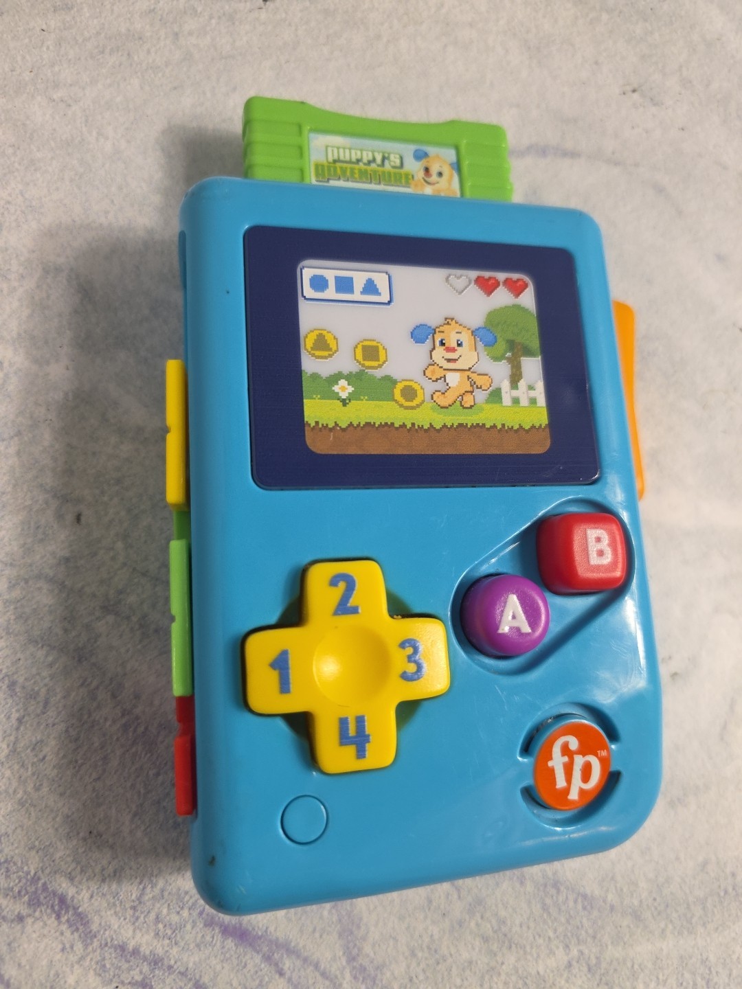 Fisher-Price Laugh & Learn Lil’ Gamer Pretend Video Game Learning Toy for Kids