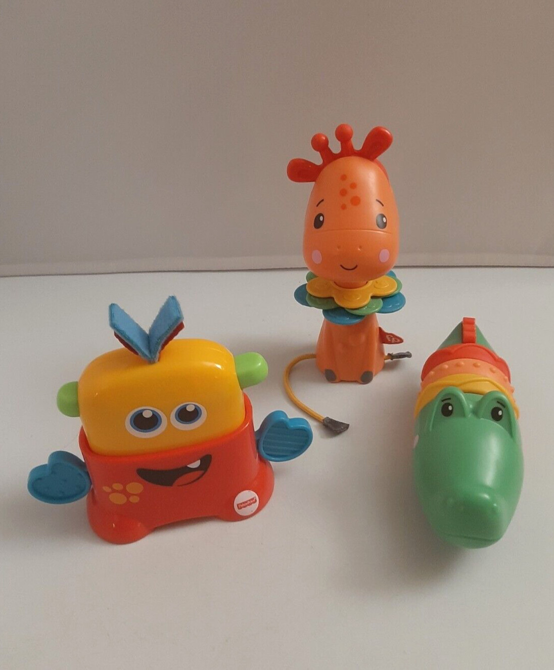 Fisher Price Toys Squeek Monster Giraffe Click Clack Crocodile Rattle